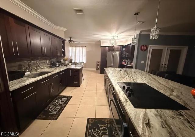 Photo 3 of Single family home for sale at 122 Grant Blvd, Lehigh Acres, FL 33974 | MLS# 2026015139 | Listing updated on 2026-03-31