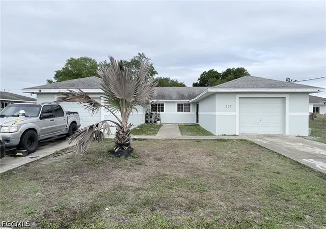 1st image of 305 307 Harry Ave S, Lehigh Acres, FL 33973 | MLS# 2026015332