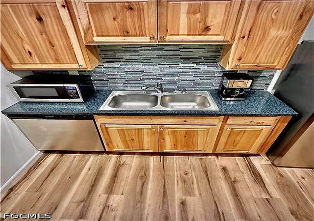 Listing Photo 4 - Condo for sale in building located at 708 Victoria Dr, Cape Coral, FL 33904 - Unit #105