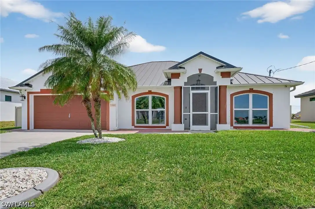 Single family home for sale at 1223 NW 40th Place, Cape Coral, FL 33993 | MLS# 226013673