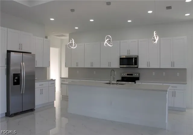 3rd image of 3316 7Th St Sw, Lehigh Acres, FL 33976 | MLS# 2026015835