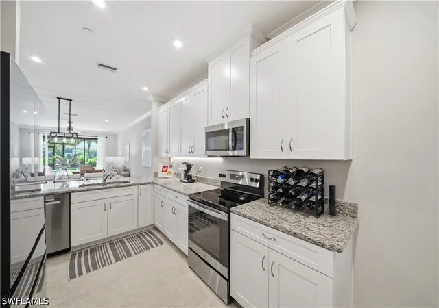 Listing Photo 4 - Condo for sale in building located at 9394 Pocida Ct, Naples, FL 34119 - Unit #101