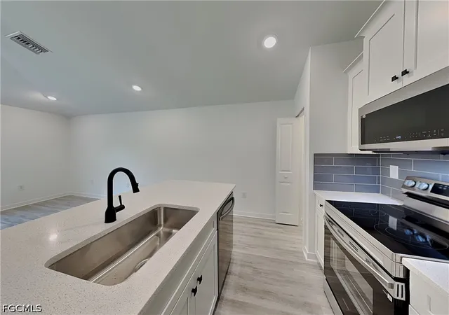 Photo 2 of Single family home for sale at 1217 Clayton Ave W, Lehigh Acres, FL 33972 | MLS# 2026016102 | Listing updated on 2026-05-04