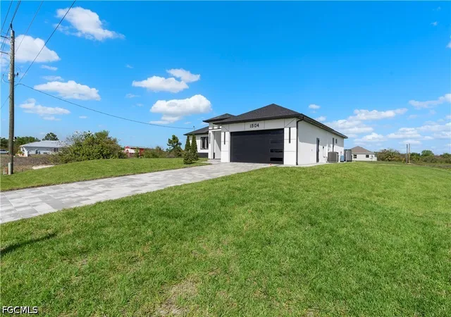 Photo 4 of Sale Pending at 1504 Moore Ave, Lehigh Acres, FL 33972 | MLS# 2026016130 | Listing updated on 2026-08-03