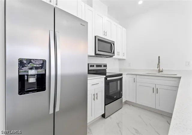 4th image of 4741/4743 29Th St Sw, Lehigh Acres, FL 33973 | MLS# 226014945