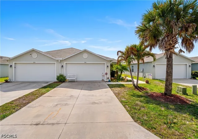 Photo 1 of Townhouse for sale at 9158 Aegean Cir, Lehigh Acres, FL 33936 | MLS# 2026017488 | Listing updated on 2026-10-02