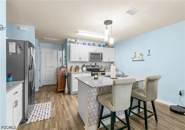 Photo 4 of Townhouse for sale at 9158 Aegean Cir, Lehigh Acres, FL 33936 | MLS# 2026017488 | Listing updated on 2026-10-02