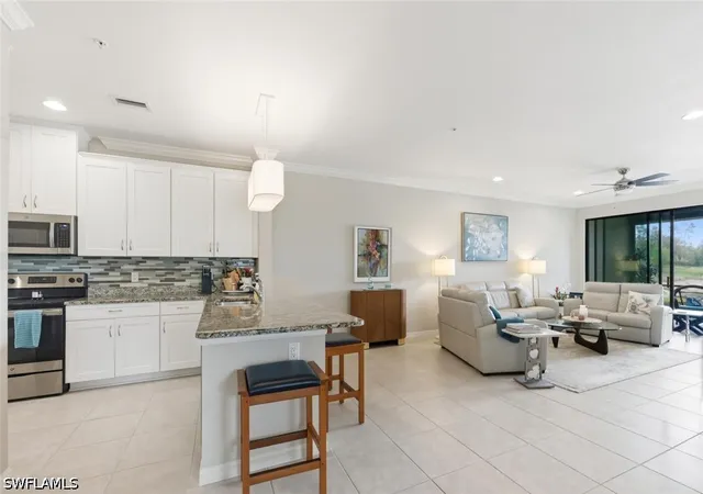 Listing Photo 4 - Condo for sale in building located at 9440 Benvenuto Ct, Naples, FL 34119 - Unit #3-104