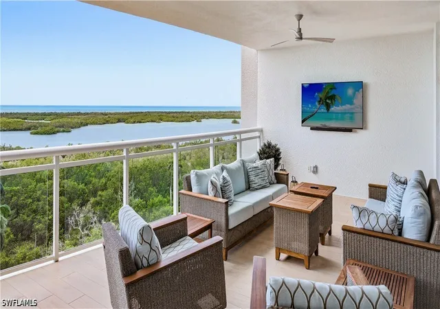 Listing Photo 1 - Condo for sale in building located at 13925 Old Coast Rd, Naples, FL 34110 - Unit #905