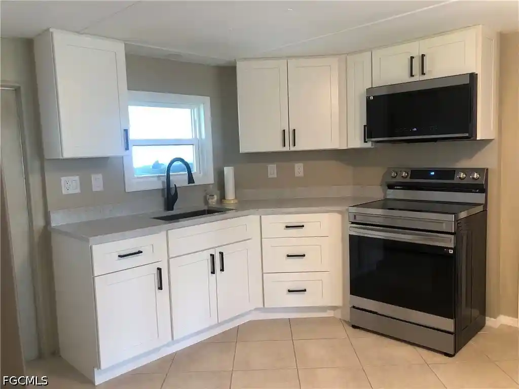 Manufactured home for sale at 135 Chisholm Trl, North Fort Myers, FL 33917 | MLS# 2026018049