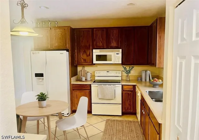 Photo 3 of Townhouse for sale at 9620 Roundstone Cir, Fort Myers, FL 33967 | MLS# 226016031 | Listing updated on 2026-07-22