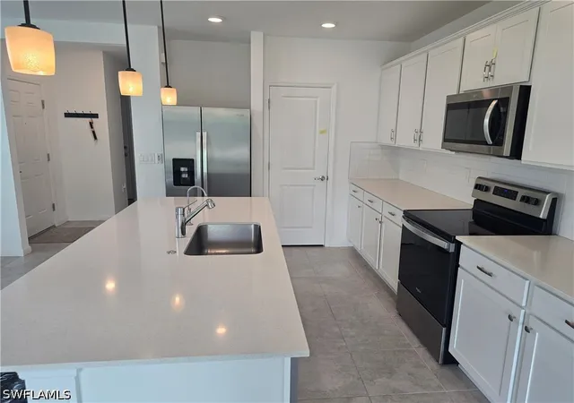 Photo 3 of Sale Pending at 1437 Weeping Willow Ct, Cape Coral, FL 33909 | MLS# 226014672 | Listing updated on 2026-06-11