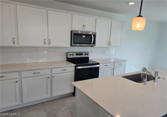 Photo 3 of Sale Pending at 1437 Weeping Willow Ct, Cape Coral, FL 33909 | MLS# 226014672 | Listing updated on 2026-06-11