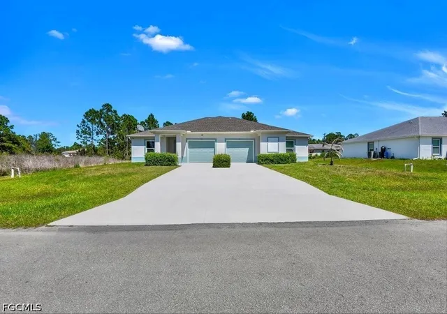 Photo 1 of Multi family home for sale at 849/851 Bedford Dr, Lehigh Acres, FL 33974 | MLS# 2026018719 | Listing updated on 2026-04-30
