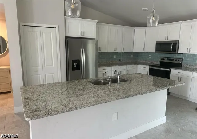 Photo 3 of Sale Pending at 504 Moore Ave, Lehigh Acres, FL 33972 | MLS# 2026018915 | Listing updated on 2026-07-01