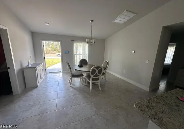 Photo 3 of Sale Pending at 504 Moore Ave, Lehigh Acres, FL 33972 | MLS# 2026018915 | Listing updated on 2026-07-01