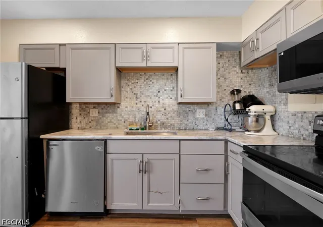 Listing Photo 5 - Condo for sale in building located at 1560 Colonial Blvd, Fort Myers, FL 33907 - Unit #235
