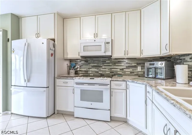 Listing Photo 4 - Condo for sale in building located at 15452 Admiralty Cir, North Fort Myers, FL 33917 - Unit #9