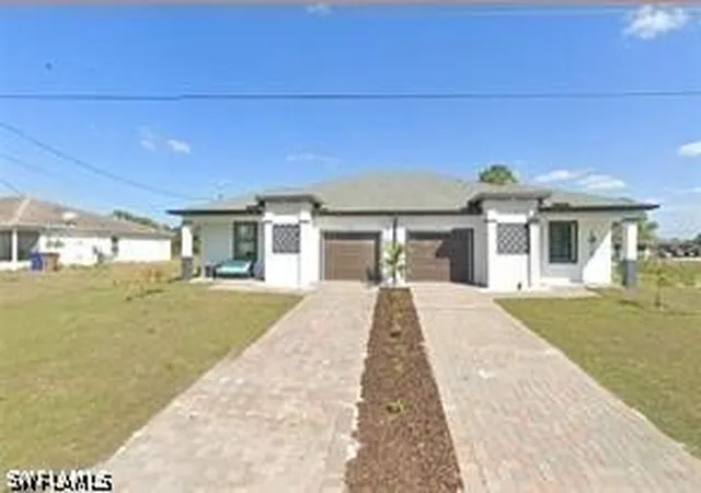 1st image of 129 131 Ivan Ave S, Lehigh Acres, FL 33973 | MLS# 226017444