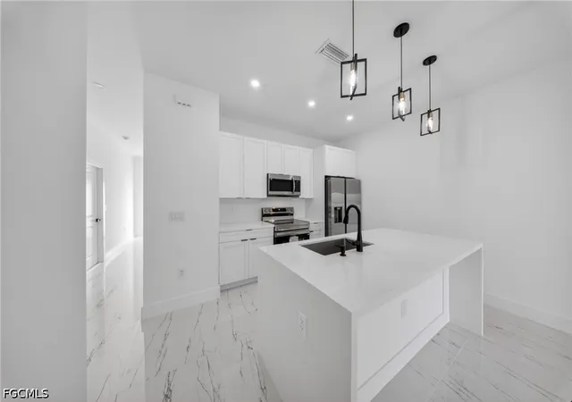 4th image of 4546 25Th St Sw, Lehigh Acres, FL 33973 | MLS# 2026019553