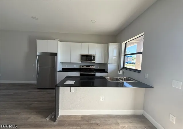 4th image of 332/334 Gilbert Ave S, Lehigh Acres, FL 33973 | MLS# 2026019717