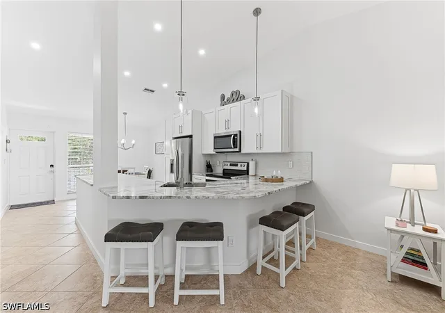 Listing Photo 5 - Condo for sale in building located at 887 Gulf Pavilion Dr, Naples, FL 34108 - Unit #203