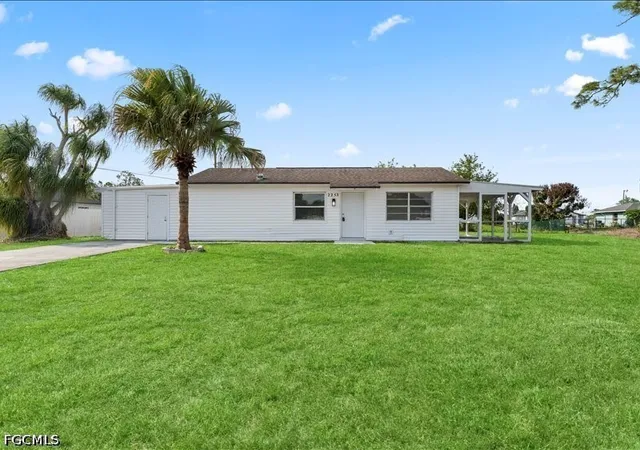 1st image of 2253 10th Ct, Lehigh Acres, FL 33936 | MLS# 2026020257