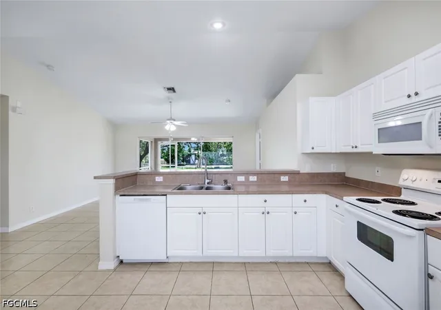 Photo 4 of Sale Pending at 2010 NE 13th Place, Cape Coral, FL 33909 | MLS# 2026020396 | Listing updated on 2026-07-11
