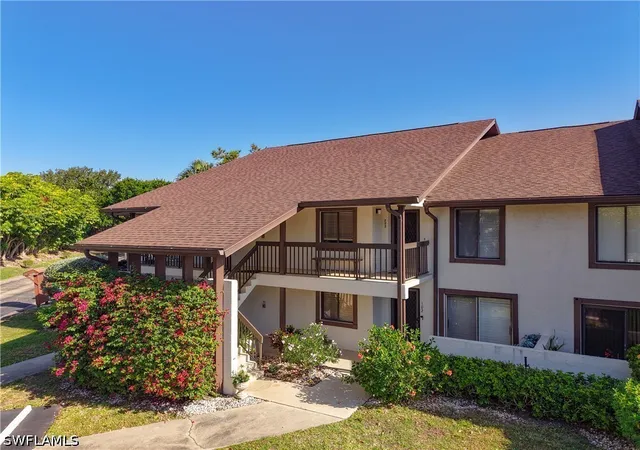 Listing Photo 4 - Condo for sale in building located at 800 Misty Pines Cir, Naples, FL 34105 - Unit #202
