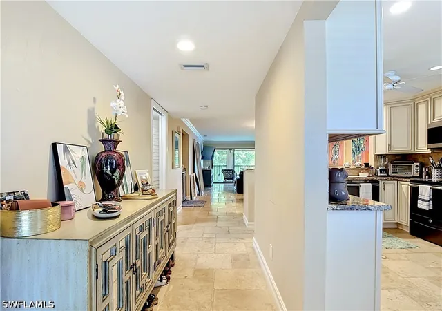 Listing Photo 5 - Condo for sale in building located at 800 Misty Pines Cir, Naples, FL 34105 - Unit #202