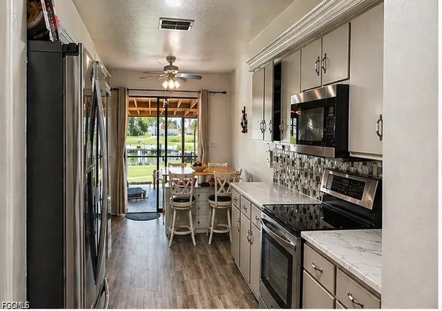 3rd image of 145 Se 32Nd St, Cape Coral, FL 33904 | MLS# 2026020928