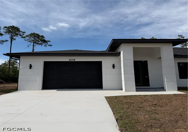 Photo 1 of House for sale at 609 E 12th Street, Lehigh Acres, FL 33972 | MLS# 2026022283 | Listing updated on 2026-07-26