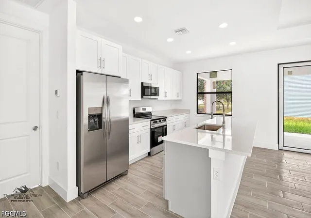 4th image of 831 Angelo Ave, Lehigh Acres, FL 33971 | MLS# 2026022378