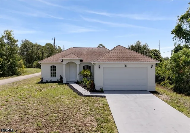 1st image of 104 Denis Ave N, Lehigh Acres, FL 33971 | MLS# 2026023527