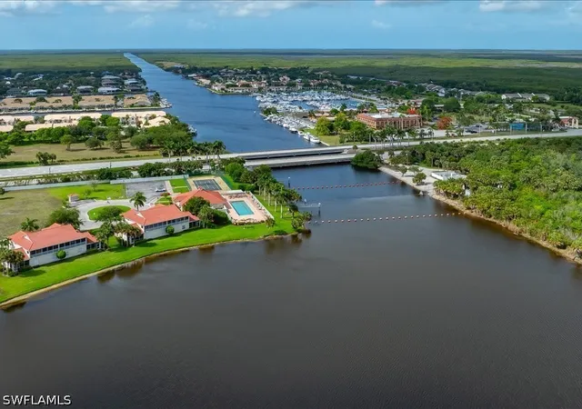 Listing Photo 4 - Condo for sale in building located at 25064 Peacock Ln, Naples, FL 34114 - Unit #101
