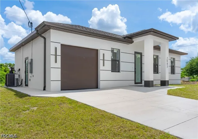 2nd image of 2803 1st St W, Lehigh Acres, FL 33971 | MLS# 2026023694