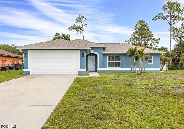 1st image of 148 Ocean Park Dr, Lehigh Acres, FL 33972 | MLS# 2026023823