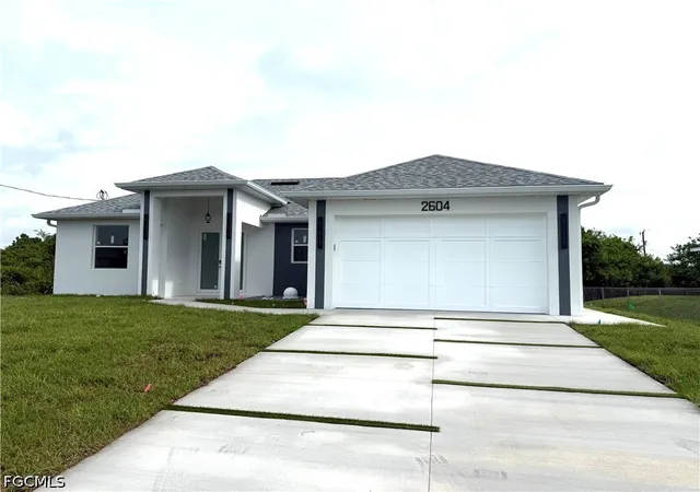 Photo 2 of Single family home for sale at 2604 15th Street Sw, Lehigh Acres, FL 33976 | MLS# 2026023826 | Listing updated on 2026-10-01