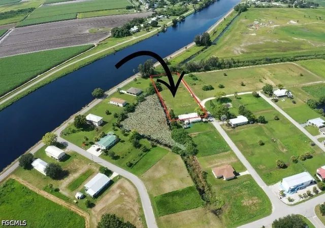 1st image of 932 940 Meyerchick Dr Sw, Moore Haven, FL 33471 | MLS# 2026023900