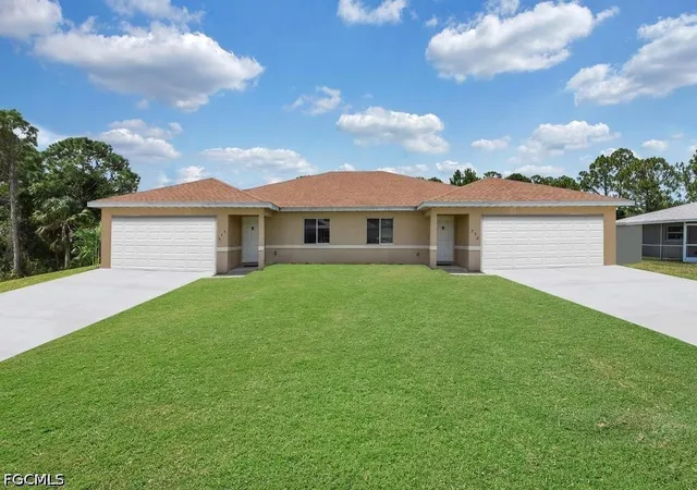 Photo 1 of Sale Pending at 732/734 Holmes Ave, Lehigh Acres, FL 33974 | MLS# 2026023903 | Listing updated on 2026-08-31