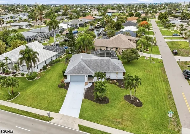 1st image of 4129 Country Club Blvd, Cape Coral, FL 33904 | MLS# 2026024066