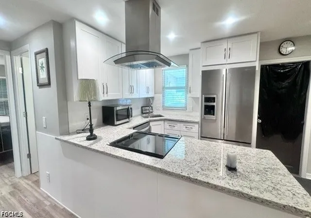 Photo 2 of Manufactured home for sale at 5509 Miles Standish Ln, North Fort Myers, FL 33917 | MLS# 2026024325 | Listing updated on 2026-10-05