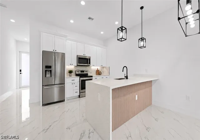 Listing Photo 4 - Condo for sale in building located at 1318/1320 NE 16th Ter, Cape Coral, FL 33909
