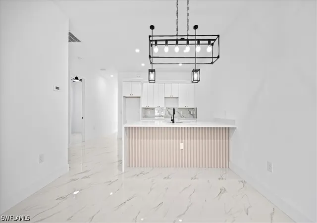 Listing Photo 5 - Condo for sale in building located at 1318/1320 NE 16th Ter, Cape Coral, FL 33909