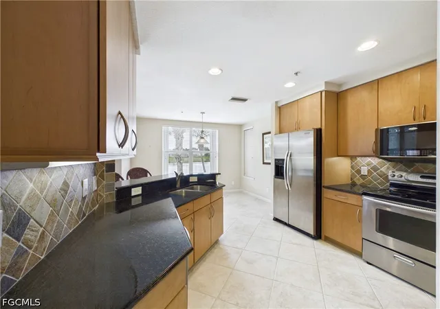 Listing Photo 3 - Condo for sale in building located at 12971 Pennington Pl, Fort Myers, FL 33913 - Unit #102