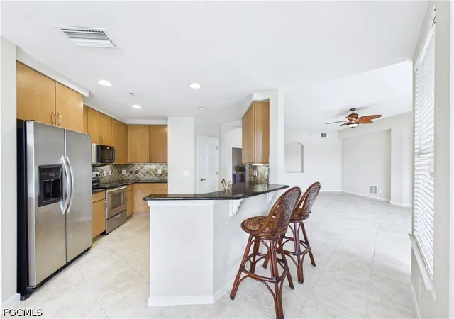 Listing Photo 5 - Condo for sale in building located at 12971 Pennington Pl, Fort Myers, FL 33913 - Unit #102