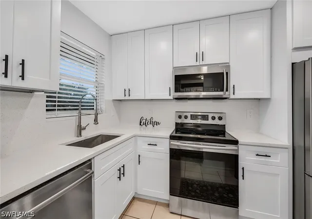 Listing Photo 1 - Condo for sale in building located at 499 Forest Lakes Blvd, Naples, FL 34105 - Unit #312