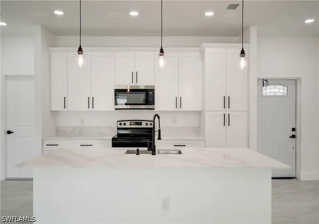 3rd image of 1020 Carroll St E, Lehigh Acres, FL 33974 | MLS# 226021631