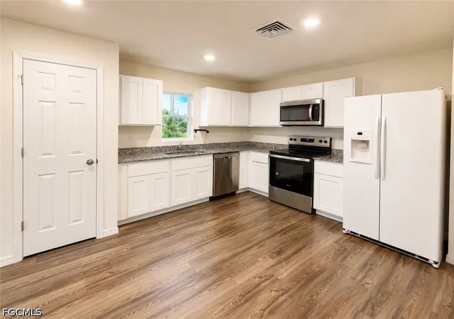 4th image of 936 Panda Dr, Lehigh Acres, FL 33974 | MLS# 2026024935