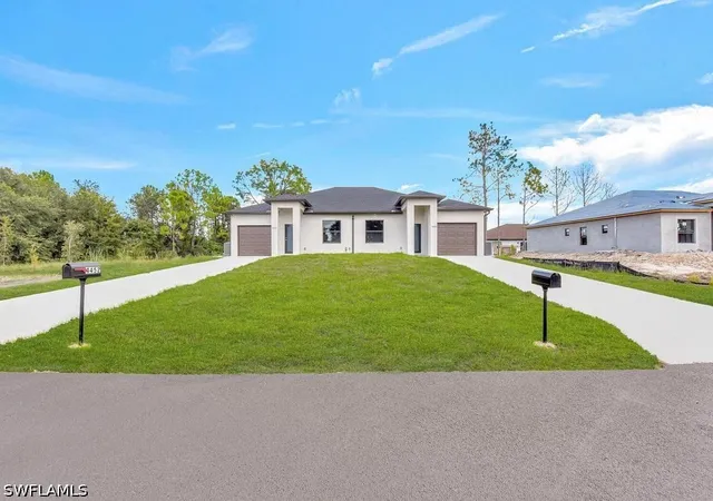 1st image of 4709/4711 21 Street Sw, Lehigh Acres, FL 33973 | MLS# 226022138